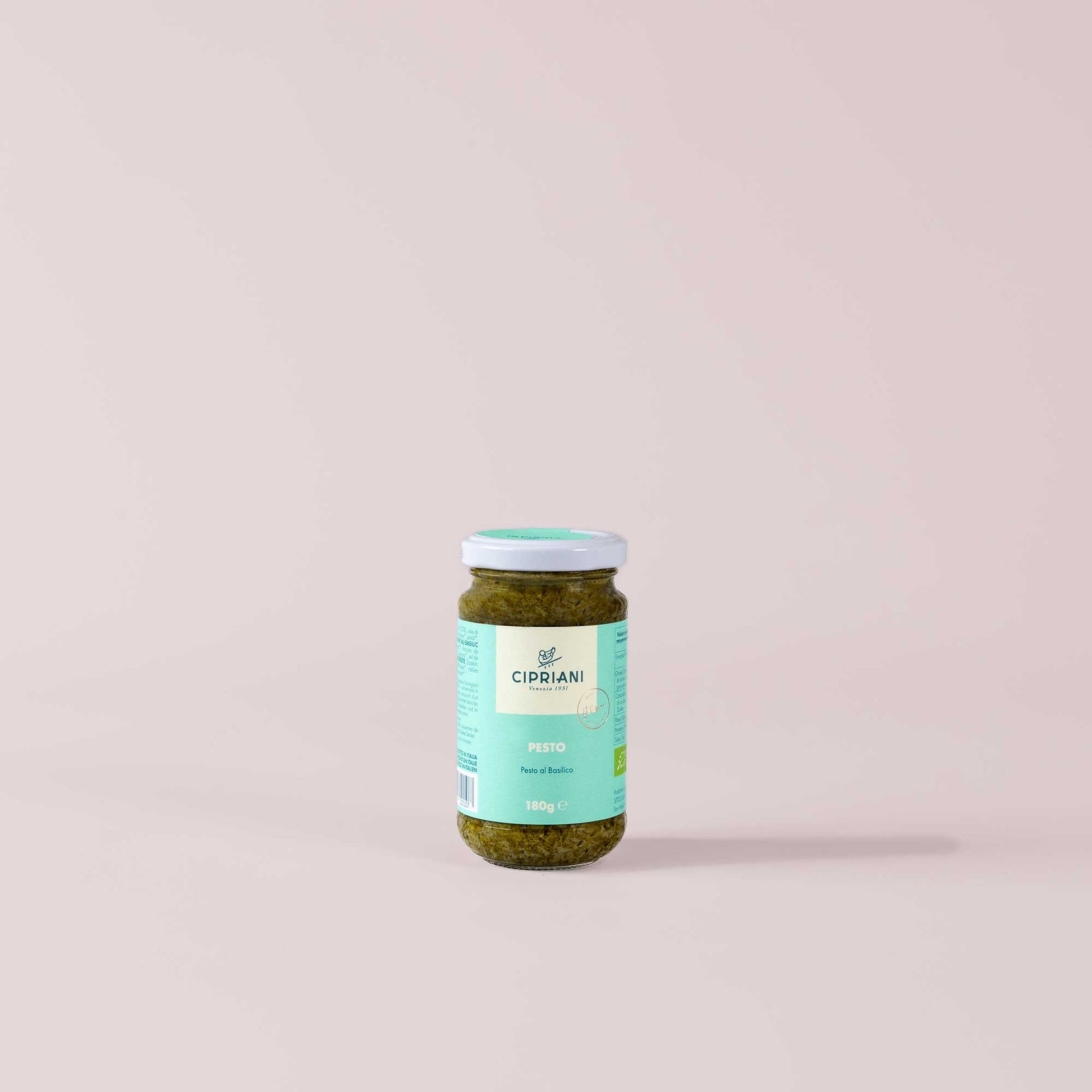 Jar of Cipriani pesto on a light pink background